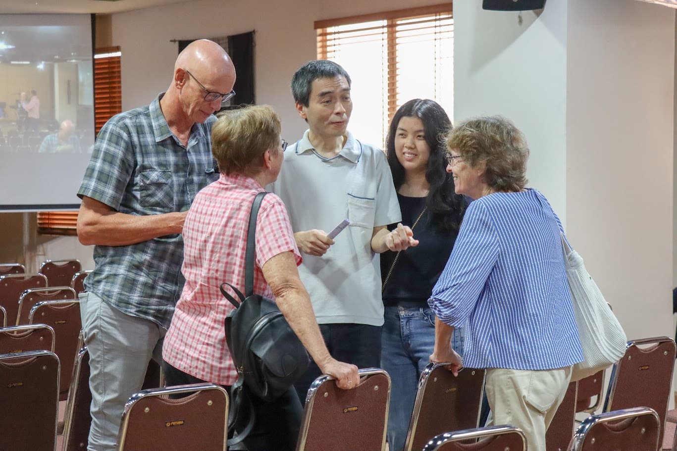 Members of the congregation talking together after the service